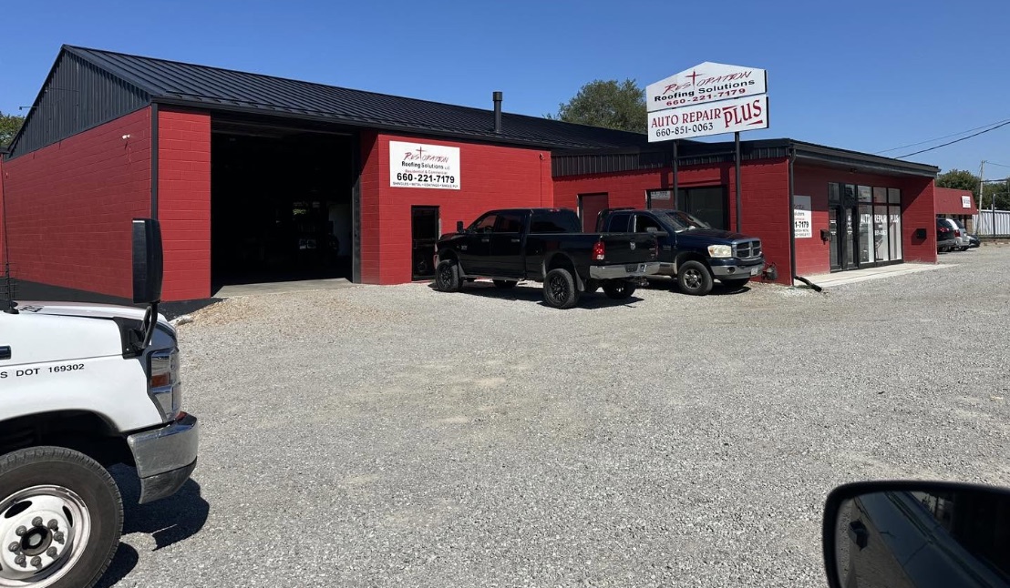 Restoration Roofing Solutions shop on W Main St